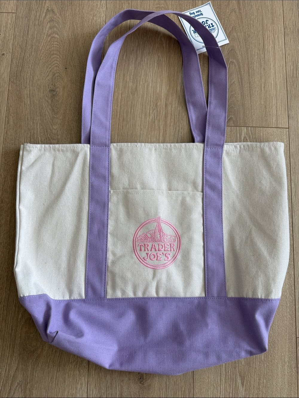 NWT Trader Joe’s Large Lavender Tote with Pink
Logo